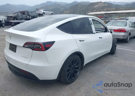 2023 Tesla Model Y Awd/Long Range Dual Motor All-Wheel Drive from USA, damaged, VIN 7SAYGAEE4PF752629